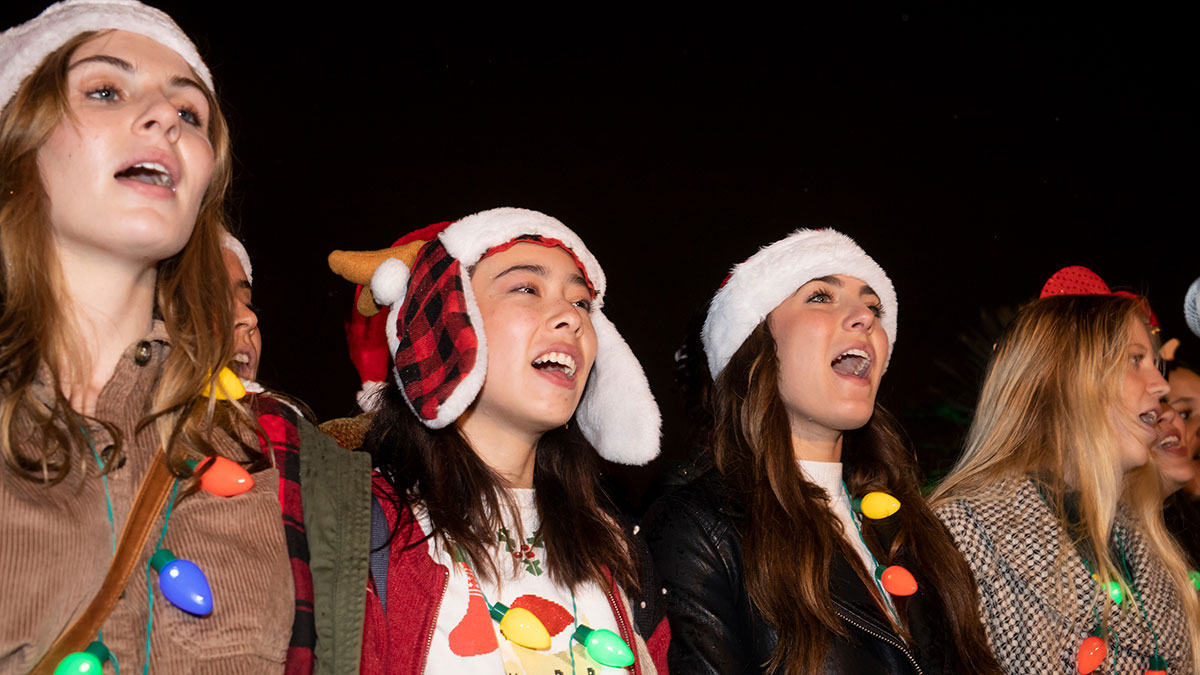 Students singing along with Christmas carols