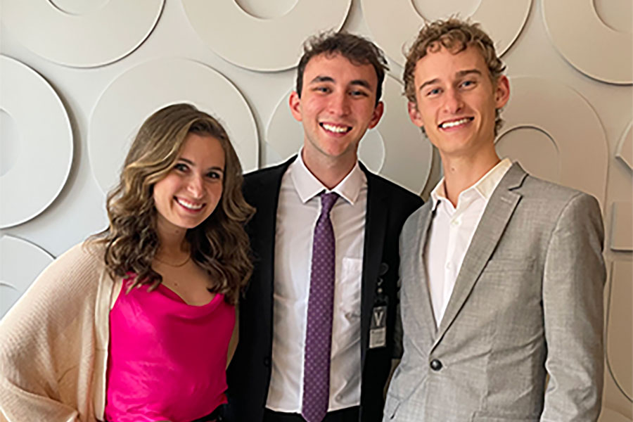 three students who won first place in Effie competition