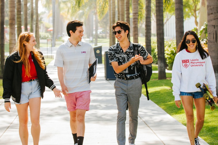 LMU students walking side by side