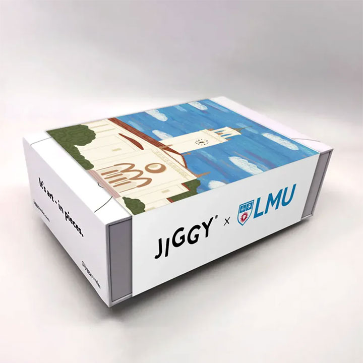Jiggy game with Sacred Heart Chapel and the LMU logo on the box