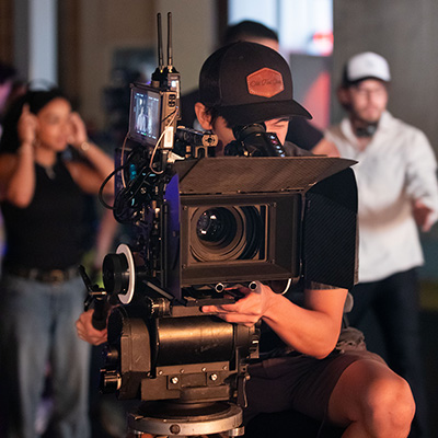 students behind a video camera