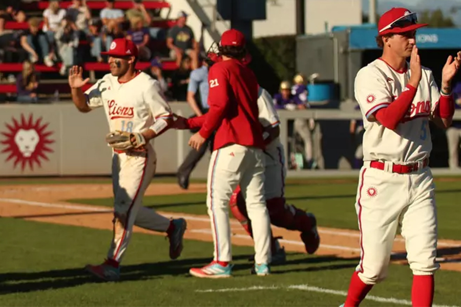 LMU Baseball players walk off the field after a victory over WA Huskies