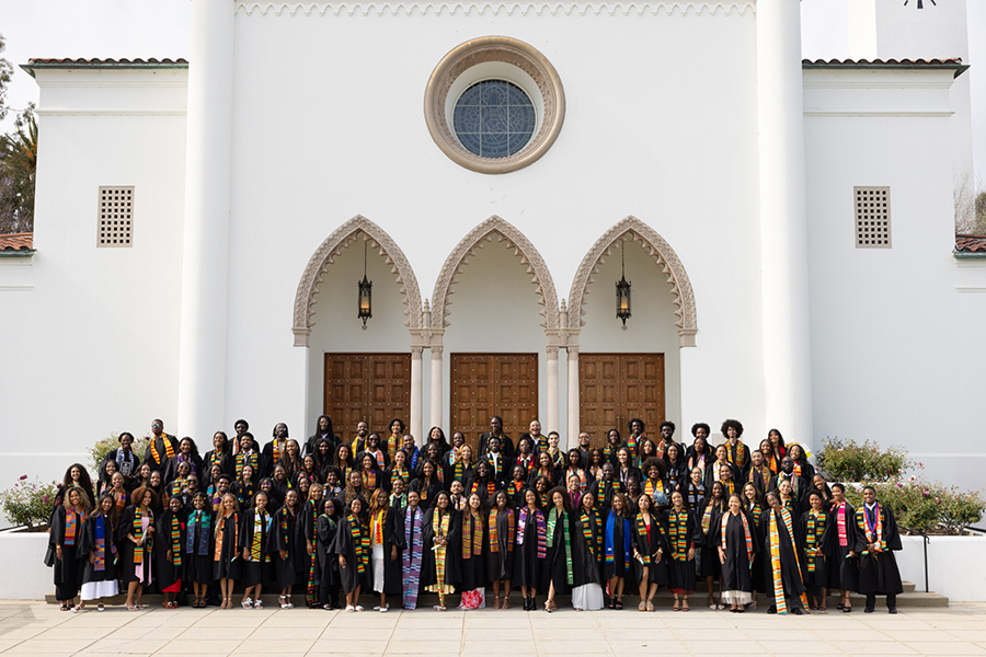 Graduates standing outside of LMU Sacred Heart Chapel