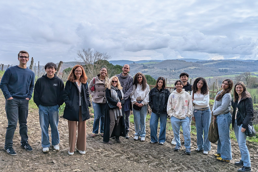 LMU Management Students pose as a group while exploring food ethics in Italy