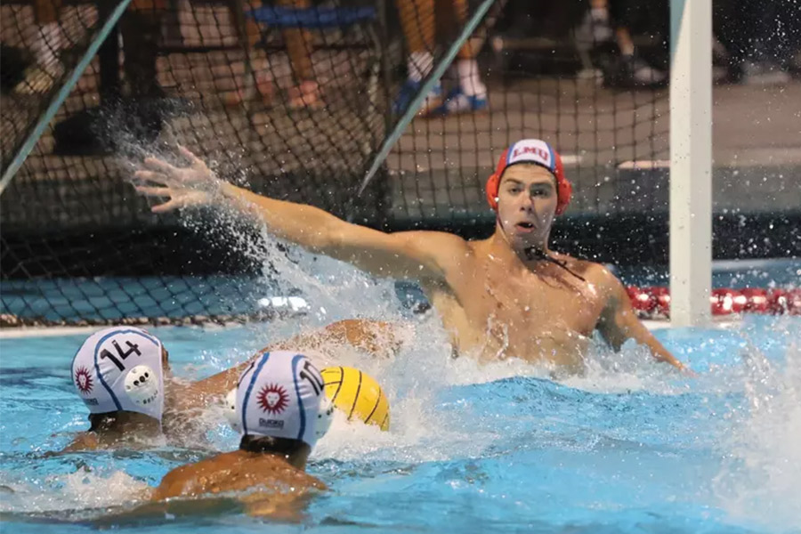 Three LMU Men's Water Polo Players during a match