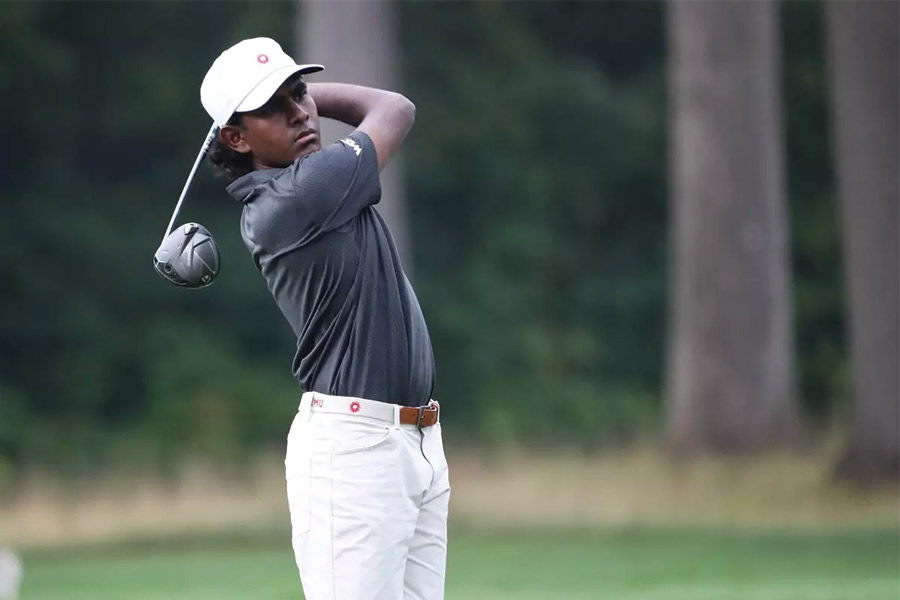 LMU's Nateesh Anatha Ganesh swings a golf club