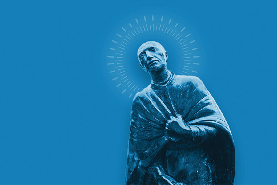 A statue of St. Ignatius with an animated halo