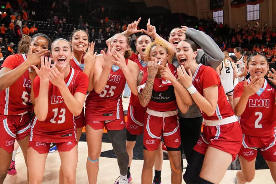 LMU Women's Basketball Players celebrating after their WCC Title Win