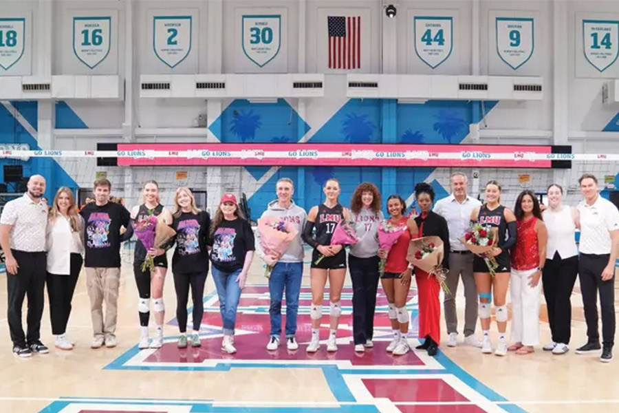 LMU women's volleyball team and coaches
