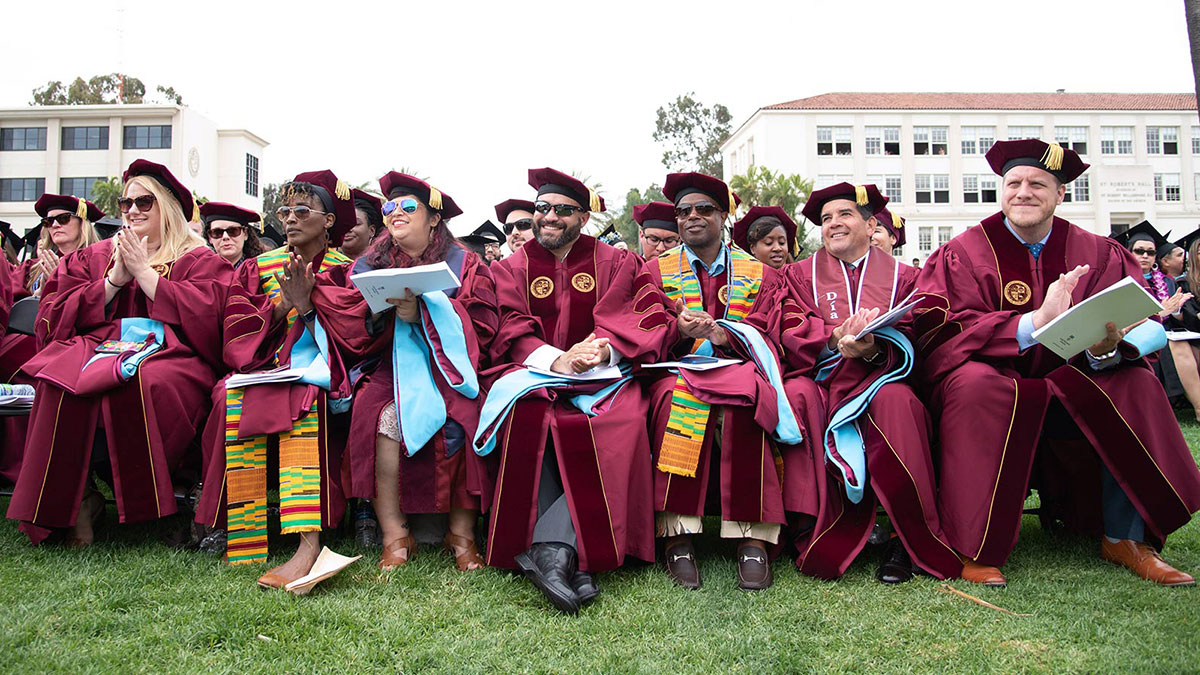 Graduate students seated during Commencement