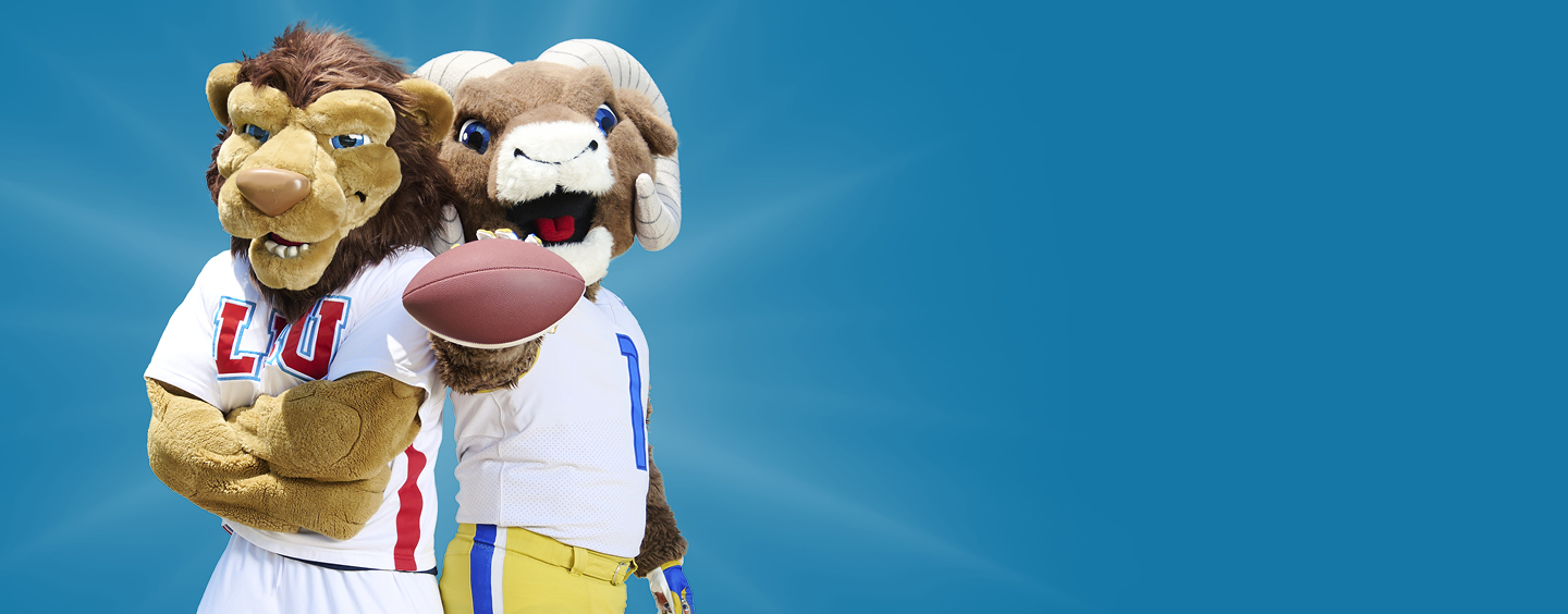 Iggy the Lion and L.A. Rams Rampage mascots holding a football