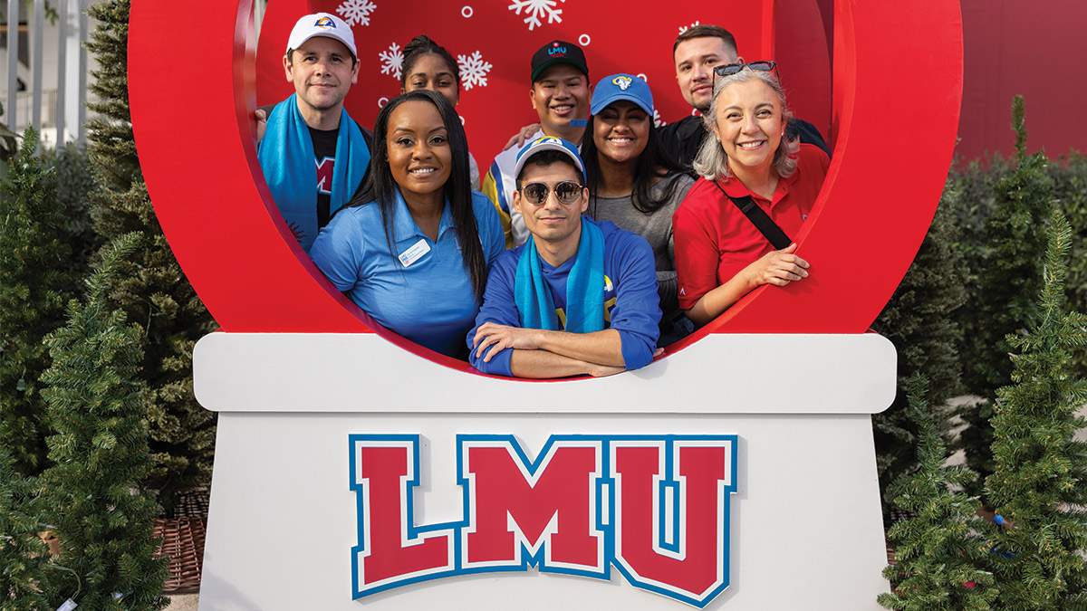 LMU fans gather in a snowglobe for LMU Day at the Rams