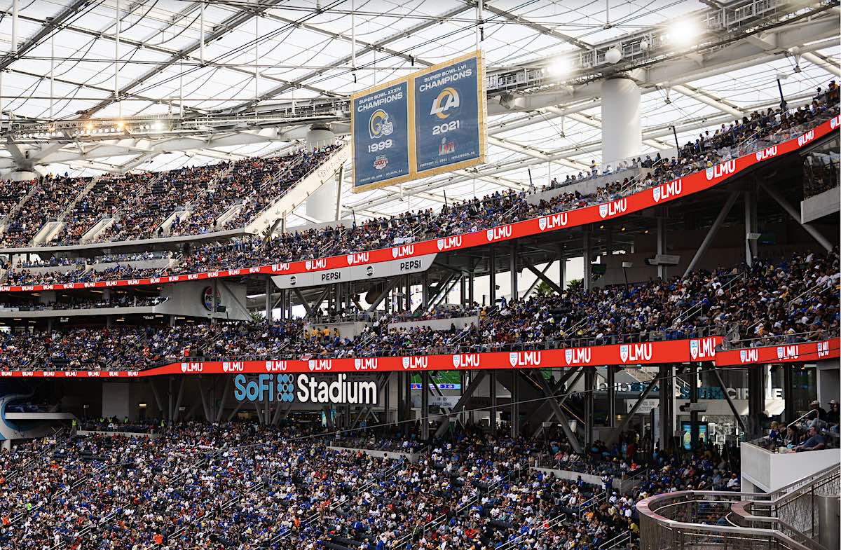 Ribbon boards at SoFi stadium displaying the LMU logo