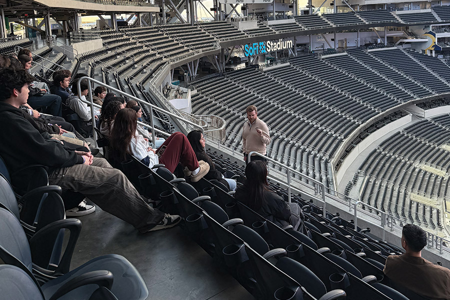 Tyler Potts speaks to LMU Students at SoFi Stadium