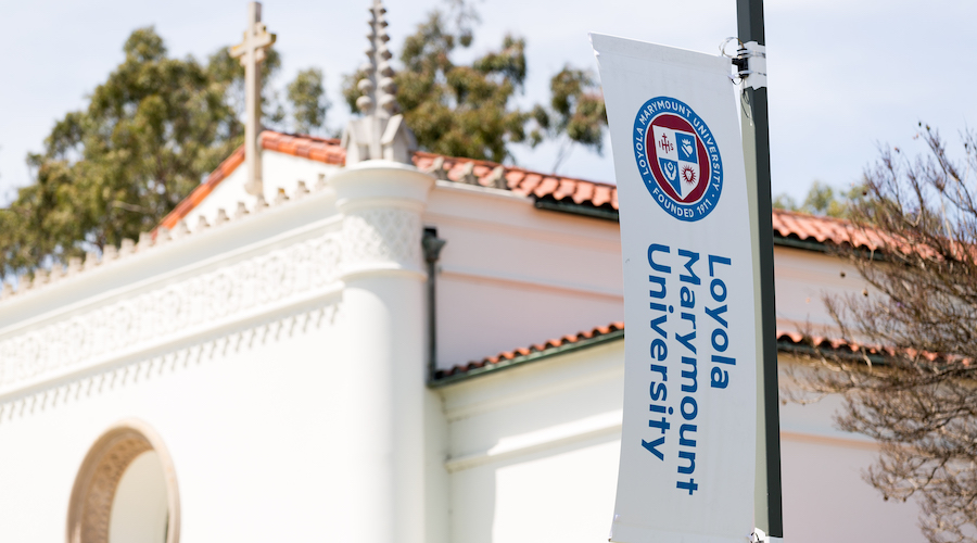A banner hanging from a pole on the LMU campus.